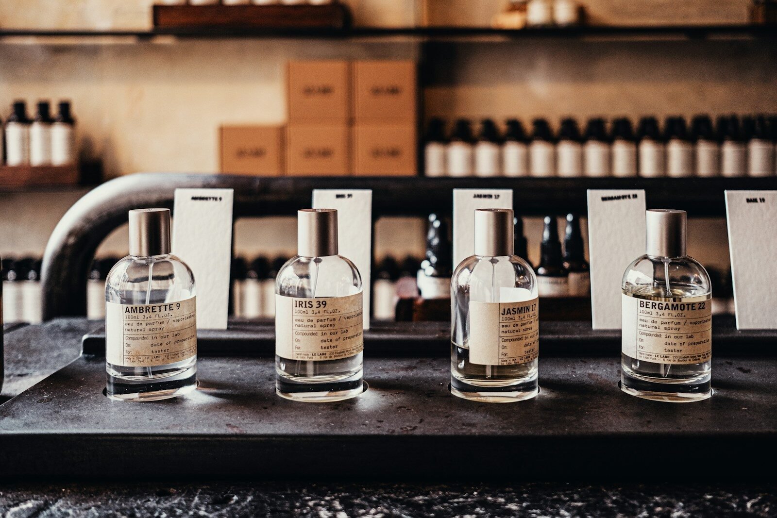 a row of bottles sitting on top of a counter